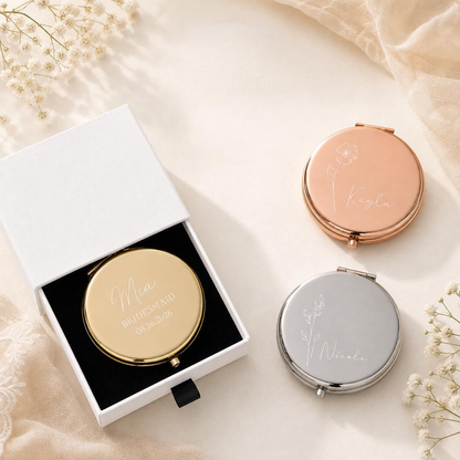 Gold rose gold and silver personalized bridesmaid compact mirrors with a white gift box and black pull tab