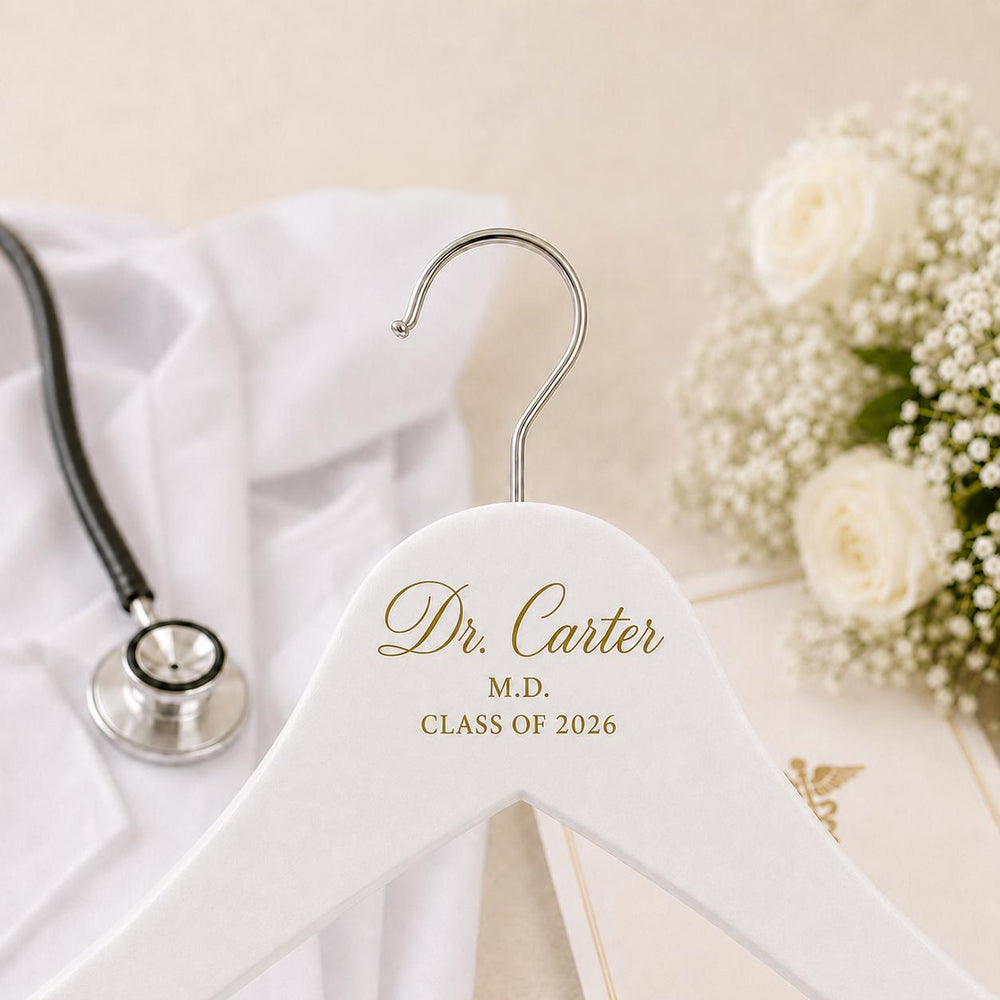 Personalized white wood white coat ceremony hanger with doctor name and credentials.