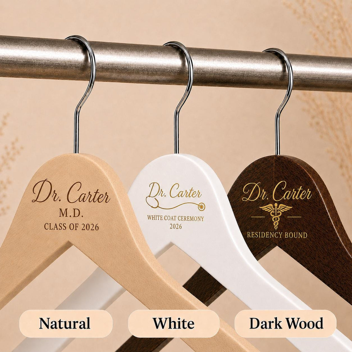 Personalized wooden hangers shown in the available finishes