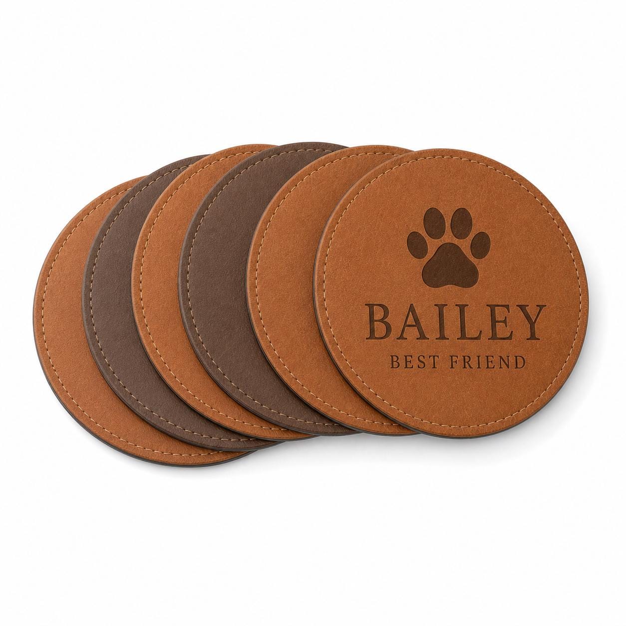 Six personalized pet name leather coasters in Saddle Tan and Walnut