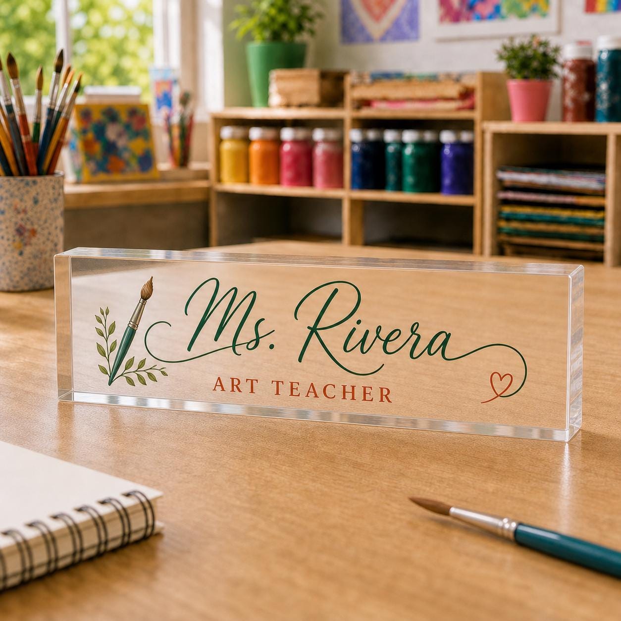Art Teacher personalized transparent acrylic block nameplate exact purchasable Style 1 in a second realistic role-specific workspace