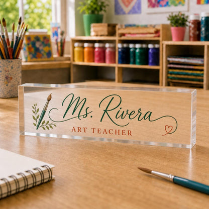 Art Teacher personalized transparent acrylic block nameplate exact purchasable Style 1 in a second realistic role-specific workspace