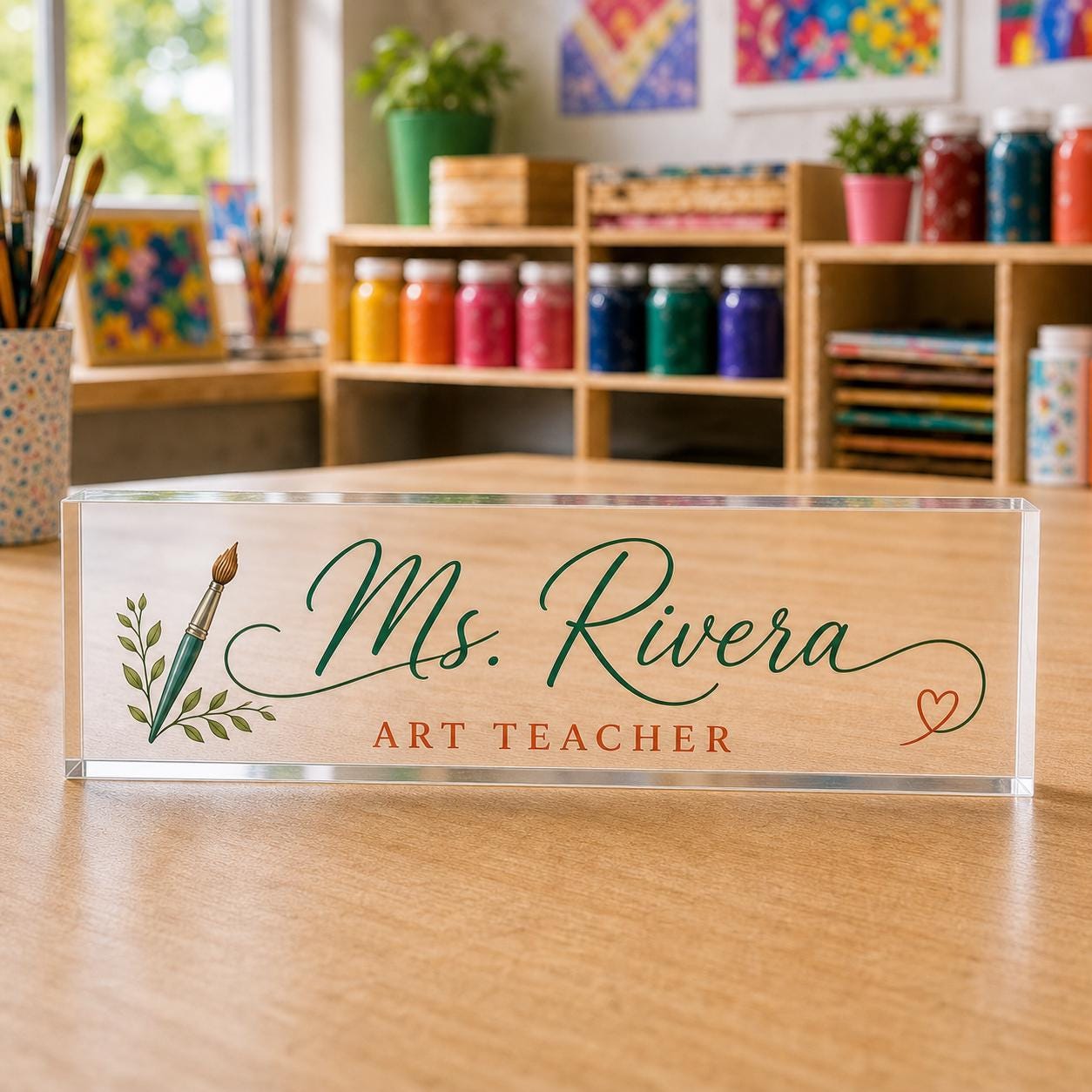 Art Teacher personalized transparent acrylic block nameplate exact purchasable Style 1 in a realistic role-specific workspace