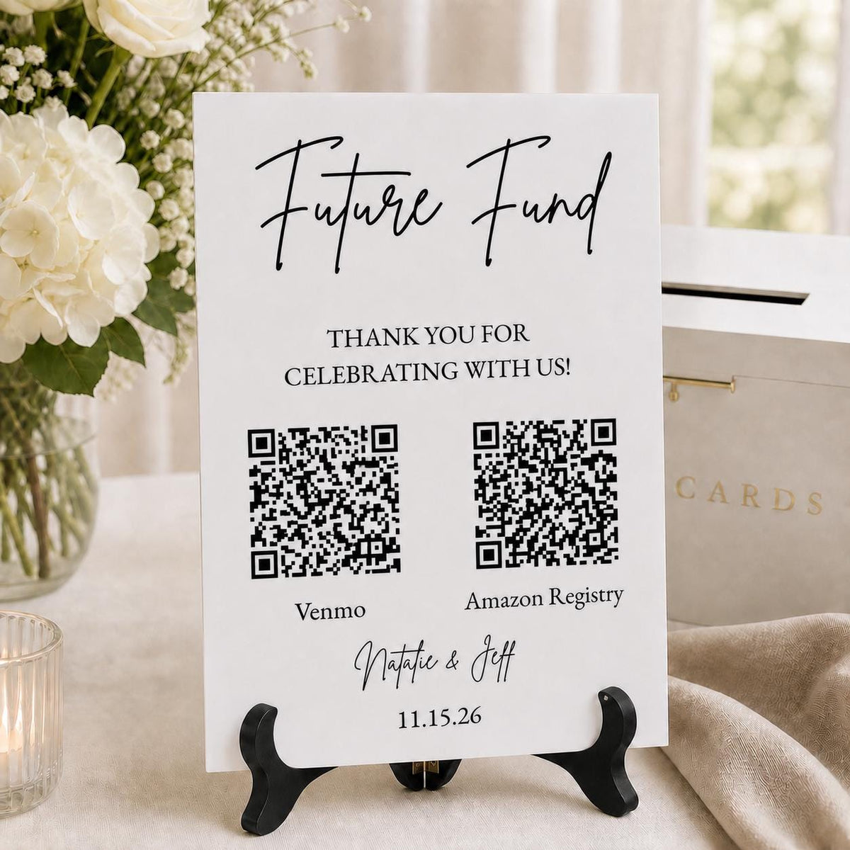 Personalized Future Fund white acrylic wedding sign on the optional black wooden folding stand at an elegant gift table