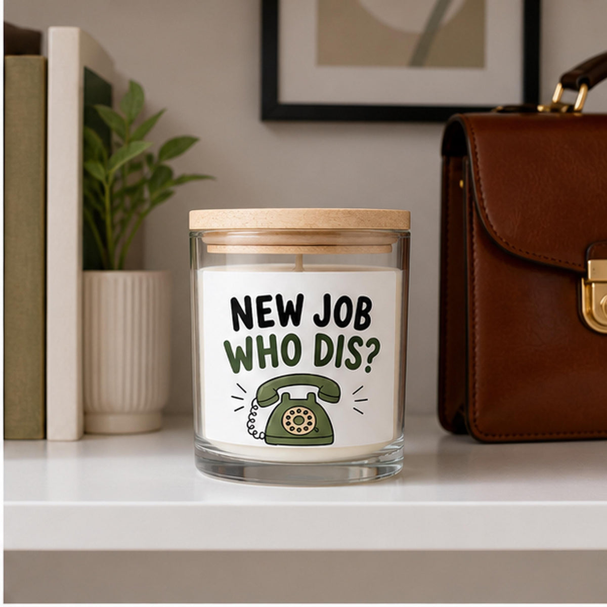 New job candle staged on a home office shelf