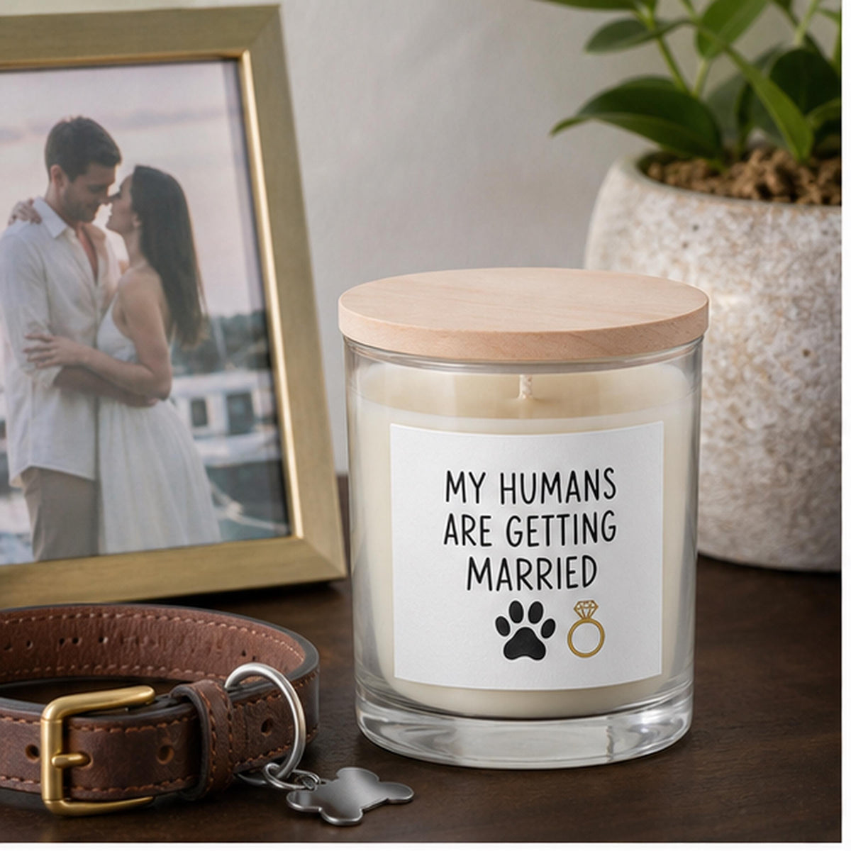 Pet engagement candle beside a framed couple photo