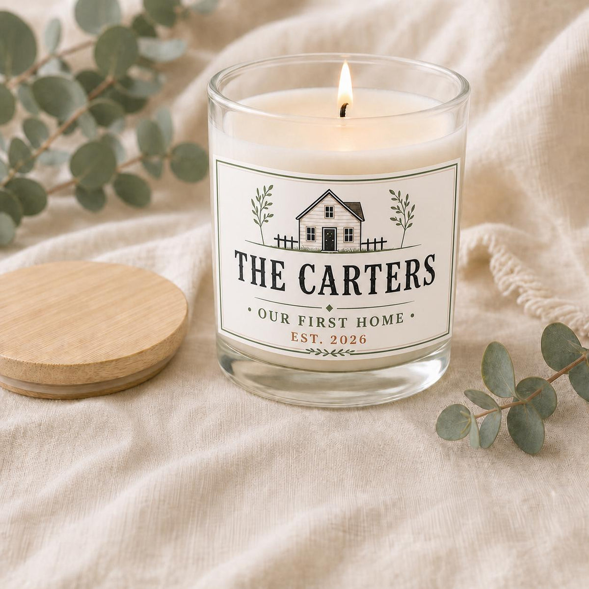 personalized New Home Candle, Custom Family Name Housewarming Gift in a staged gift setting