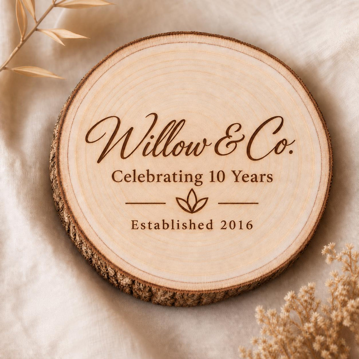 Business Anniversary personalized engraved wood slice. Engraving detail.