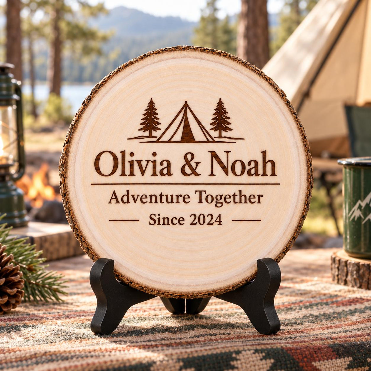 Camping Couple Gift displayed on the optional black wooden stand in a matching setting. Approved thumbnail September 25, 2026.