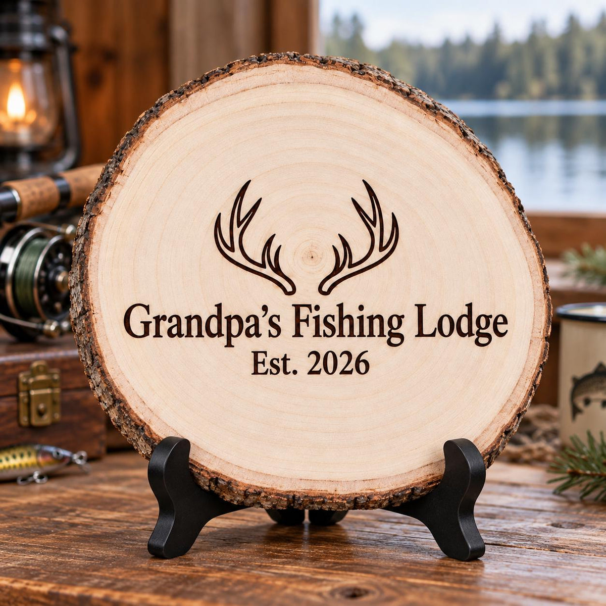 Hunting and Fishing Wood Slice Sign displayed on the optional black wooden stand in a matching setting. Approved thumbnail September 25, 2026.