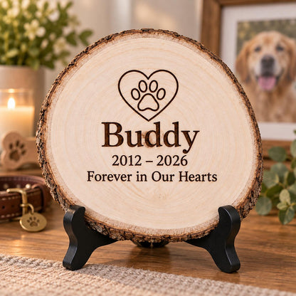 Pet Memorial Wood Slice Sign displayed on the optional black wooden stand in a matching setting. Approved thumbnail September 25, 2026.